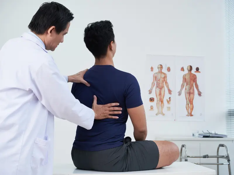 Middle Back Pain Treatment Near Me in Columbia, TN. Chiropractic Consultation for Middle Back Pain Relief.